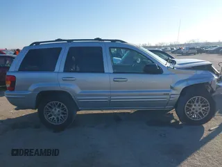 2004 Jeep Grand Cherokee Limited with VIN 1J8GX58N44C416699, listed as a IAAI auction lot 41134510 with 129,532 mi miles and . Bid and sale history available at DreamBid. Image 13.