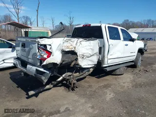 2017 GMC Sierra 2500HD Denali with VIN 1GT12UEG1HF166208, listed as a IAAI auction lot 41806983 with 144,862 mi miles. Bid and sale history available at carsss.com. Image 4.