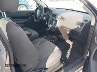 2007 Ford Focus S z VIN 1FAHP31N87W243692, wystawiony jako IAAI lot #41312958 z przebiegiem 184 717 mil mil oraz . Historia ofert i sprzedaży dostępna na DreamBid. Obrazek 5.