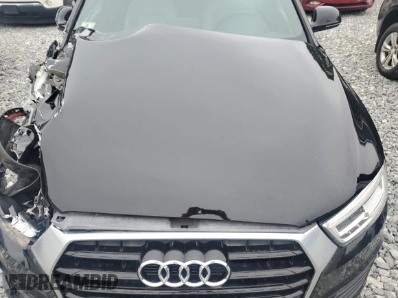 2017 Audi Q3 Prestige with VIN WA1GCCFS7HR001163, listed as a Copart auction lot 58800655 with 52,034 mi miles and Salvage title. Bid and sale history available at DreamBid. Image 12.