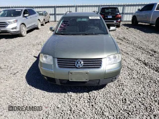 2004 Volkswagen Passat GLS z VIN WVWVD63B94E003336, wystawiony jako Copart lot #70246204 z przebiegiem 126 163 mil mil oraz Szkoda całkowita • Salvage title. Historia ofert i sprzedaży dostępna na DreamBid. Obrazek 5.