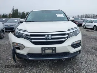 2017 Honda Pilot Elite with VIN 5FNYF6H06HB096156, listed as a IAAI auction lot 41771161 with 73,889 mi miles and . Bid and sale history available at DreamBid. Image 12.
