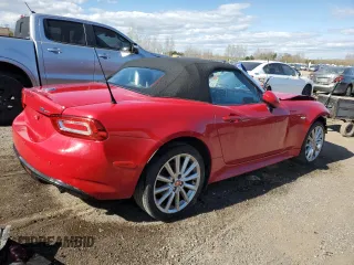 2017 FIAT 124 Spider Lusso z VIN JC1NFAEKXH0106484, wystawiony jako Copart lot #55729775 z przebiegiem 104 341 mil mil oraz Tytuł czysty. Historia ofert i sprzedaży dostępna na DreamBid. Obrazek 3.