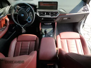 2023 BMW X4 M40i with VIN 5UX43DT0XP9S88643, listed as a Copart auction lot 62932485 with 27,865 mi miles and Salvage title. Bid and sale history available at DreamBid. Image 8.