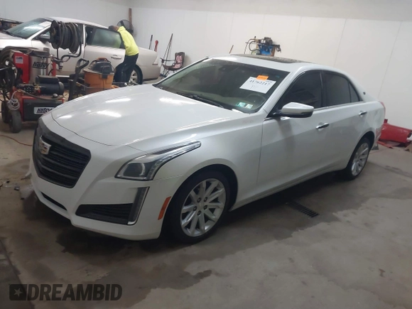 2015 Cadillac CTS Luxury AWD with VIN 1G6AX5SX5F0117267, listed as a IAAI auction lot 41762217 with 79,930 mi miles and . Bid and sale history available at DreamBid. Image 18.