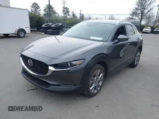 2022 Mazda CX-30 S Premium with VIN 3MVDMBDL9NM434619, listed as a IAAI auction lot 41620655 with 46,557 mi miles and . Bid and sale history available at carsss.com. Image 18.