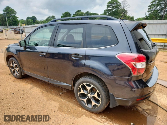 2014 Subaru Forester XT Touring with VIN JF2SJGPC6EH511379, listed as a Copart auction lot 58521725 with 152,744 mi miles and Clean title. Bid and sale history available at DreamBid. Image 2.