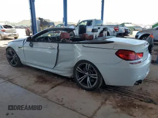 2013 BMW M6 с VIN WBSLZ9C59DDZ77823, выставлен на аукционе Copart как лот 62354225 с пробегом 74 704 миль миль и Списание • Salvage title. История ставок и продаж доступна на DreamBid. Изображение 2.