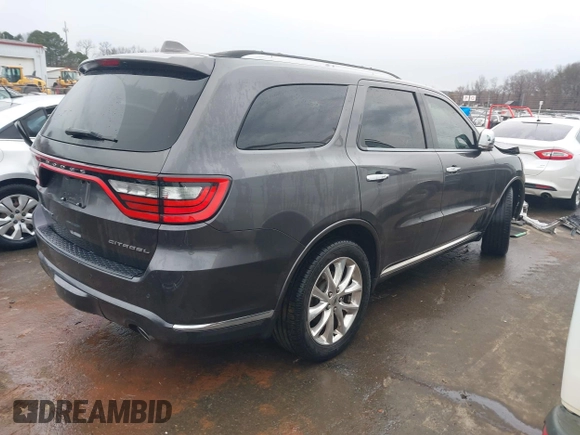 2019 Dodge Durango Citadel with VIN 1C4RDHEG2KC582281, listed as a IAAI auction lot 41614101 with 74,478 mi miles and . Bid and sale history available at DreamBid. Image 4.