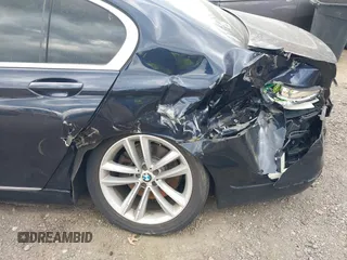 2016 BMW 7 Series 750i xDrive with VIN WBA7F2C58GG418482, listed as a IAAI auction lot 41931831 with 97,776 mi miles and . Bid and sale history available at DreamBid. Image 6.