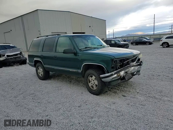 1996 GMC Yukon with VIN 1GKEK13R6TJ747606, listed as a Copart auction lot 80763434 with 308,837 mi miles and Salvage Title. Bid and sale history available at DreamBid. Image 12.