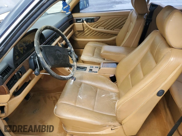 1989 Mercedes-Benz 560 with VIN WDBCA45E0KA494541, listed as a Copart auction lot 55360435 with 259,622 mi miles and Clean Title. Bid and sale history available at DreamBid. Image 7.