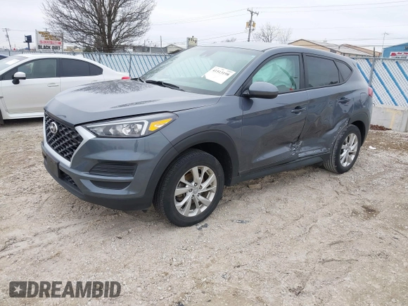 2021 Hyundai Tucson SE with VIN KM8J23A40MU299596, listed as a IAAI auction lot 41513198 with 54,284 mi miles and . Bid and sale history available at DreamBid. Image 2.