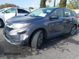 2018 Honda CR-V LX with VIN 2HKRW5H36JH426040, listed as a IAAI auction lot 42031936 with 94,564 mi miles. Bid and sale history available at carsss.com. Image 2.