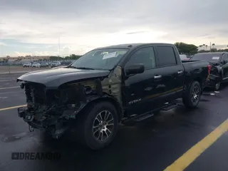2021 Nissan Titan SV with VIN 1N6AA1EF4MN503458, listed as a IAAI auction lot 42401074 with 53,558 mi miles and . Bid and sale history available at DreamBid. Image 2.