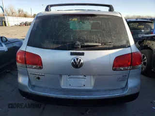 2004 Volkswagen Touareg z VIN WVGBC67L94D021426, wystawiony jako Copart lot #44059535 z przebiegiem 148 887 mil mil oraz Czysty tytuł • Clean title. Historia ofert i sprzedaży dostępna na DreamBid. Obrazek 6.