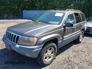 2000 Jeep Grand Cherokee Laredo with VIN 1J4GW48S8YC380039, listed as a IAAI auction lot 42510307 with 215,776 mi miles and . Bid and sale history available at DreamBid. Image 6.