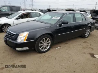 2006 Cadillac DTS 1SE with VIN 1G6KD57946U227808, listed as a Copart auction lot 85158324 with 82,180 mi miles and Salvage Title. Bid and sale history available at DreamBid. Image 1.