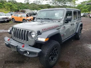 2023 Jeep Wrangler Rubicon z VIN 1C4HJXFNXPW693260, wystawiony jako Copart lot #60275285 z przebiegiem 45 390 mil mil oraz Czysty tytuł • Clean title. Historia ofert i sprzedaży dostępna na DreamBid. Obrazek 1.