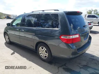 2005 Honda Odyssey EX-L with VIN 5FNRL38725B084980, listed as a IAAI auction lot 41917012 with 134,685 mi miles. Bid and sale history available at carsss.com. Image 3.