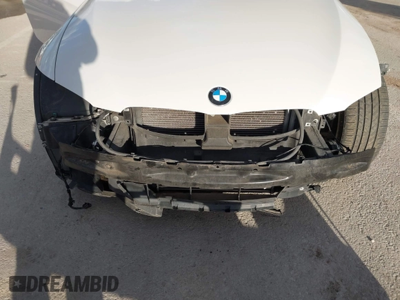2013 BMW 3 Series 335i with VIN WBAKG7C53DJ438190, listed as a IAAI auction lot 41712275 with 126,357 mi miles. Bid and sale history available at carsss.com. Image 6.