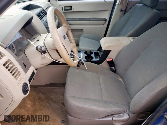2012 Ford Escape XLS with VIN 1FMCU0C70CKB66484, listed as a Copart auction lot 56584395 with 144,113 mi miles and Salvage title. Bid and sale history available at DreamBid. Image 7.