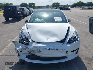 2022 Tesla Model 3 z VIN 5YJ3E1EA5NF164309, wystawiony jako IAAI lot #42195114 z przebiegiem 72 912 mil mil oraz . Historia ofert i sprzedaży dostępna na DreamBid. Obrazek 11.