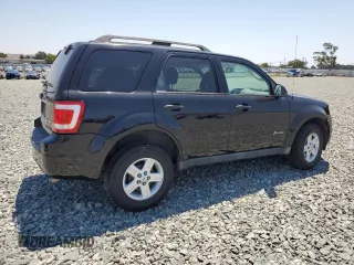 2009 Ford Escape Hybrid with VIN 1FMCU49399KB39692, listed as a Copart auction lot 64418925 with 147,204 mi miles and Salvage title. Bid and sale history available at DreamBid. Image 3.