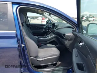 2021 Hyundai Santa Fe SE with VIN 5NMS14AJ2MH339403, listed as a IAAI auction lot 42024896 with 91,734 mi miles and . Bid and sale history available at DreamBid. Image 5.