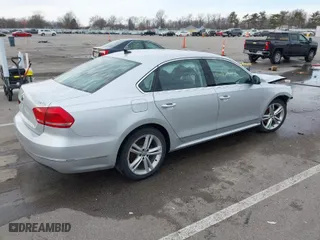 2015 Volkswagen Passat 2.0L TDI SEL Premium with VIN 1VWCV7A38FC120598, listed as a IAAI auction lot 41485502 with 126,697 mi miles. Bid and sale history available at carsss.com. Image 4.