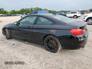 2014 BMW 4 Series 428i with VIN WBA3N7C52EK221073, listed as a Copart auction lot 63798085 with 101,862 mi miles and Salvage title. Bid and sale history available at DreamBid. Image 2.