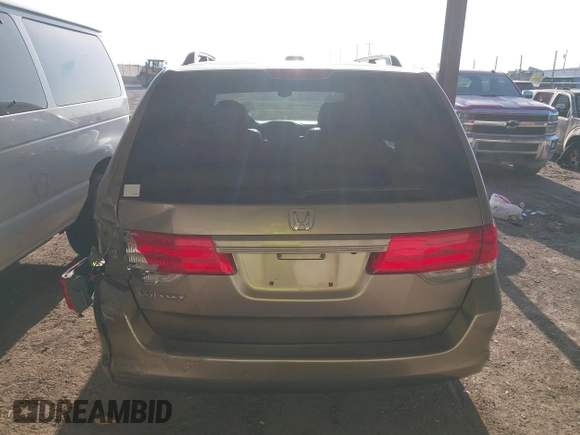 2010 Honda Odyssey EX-L with VIN 5FNRL3H79AB048049, listed as a IAAI auction lot 42055090 with 142,736 mi miles. Bid and sale history available at carsss.com. Image 16.
