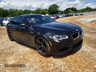 2014 BMW M5 z VIN WBSFV9C58ED097285, wystawiony jako Copart lot #55835345 z przebiegiem 108 189 mil mil oraz Szkoda całkowita • Salvage title. Historia ofert i sprzedaży dostępna na DreamBid. Obrazek 13.