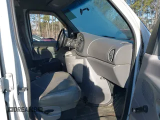 1999 Ford Econoline Cargo Commercial with VIN 1FTNE24L6XHB25183, listed as a IAAI auction lot 41391984 with 205,804 mi miles and . Bid and sale history available at carsss.com. Image 5.