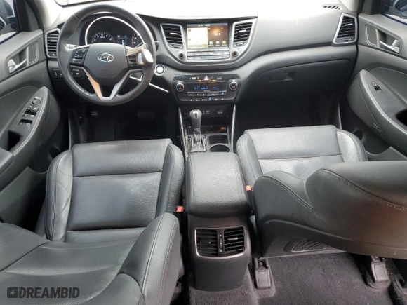 2017 Hyundai Tucson Value with VIN KM8J33A22HU367754, listed as a Copart auction lot 42009495 with 55,477 mi miles and Salvage Title. Bid and sale history available at carsss.com. Image 8.