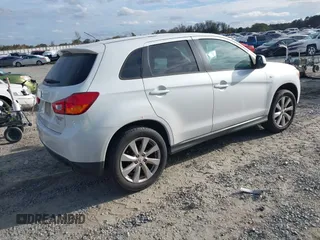 2015 Mitsubishi Outlander ES z VIN 4A4AP3AU4FE034451, wystawiony jako IAAI lot #41057102 z przebiegiem 166 263 mil mil oraz . Historia ofert i sprzedaży dostępna na DreamBid. Obrazek 4.