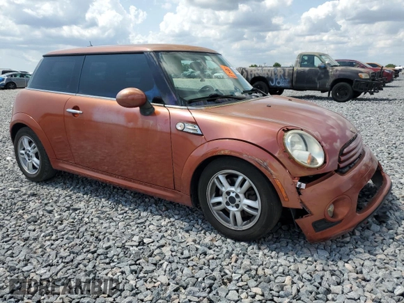 2011 MINI Hardtop with VIN WMWSU3C52BT094399, listed as a Copart auction lot 56561635 with 94,428 mi miles and Salvage Title. Bid and sale history available at DreamBid. Image 4.