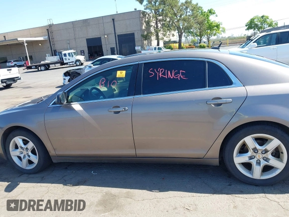 2011 Chevrolet Malibu 1LS with VIN 1G1ZB5E1XBF215846, listed as a IAAI auction lot 42153073 with Not Provided miles and . Bid and sale history available at DreamBid. Image 14.