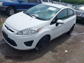 2013 Ford Fiesta S with VIN 3FADP4TJ4DM164594, listed as a IAAI auction lot 42154202 with 75,860 mi miles and . Bid and sale history available at DreamBid. Image 2.