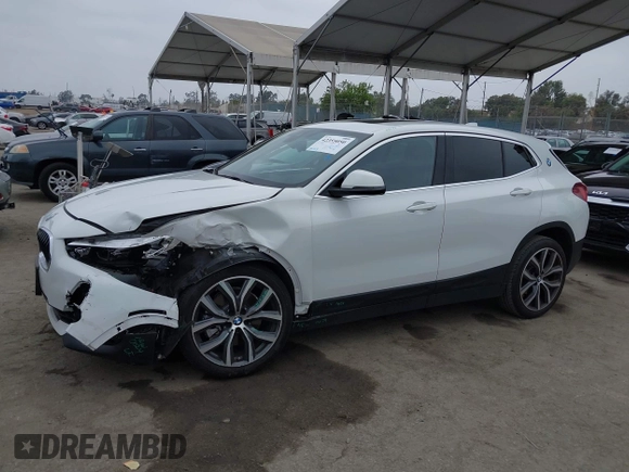 2022 BMW X2 sDrive28i z VIN WBXYH9C06N5U37719, wystawiony jako IAAI lot #42355050 z przebiegiem 33 127 mil mil oraz . Historia ofert i sprzedaży dostępna na DreamBid. Obrazek 13.