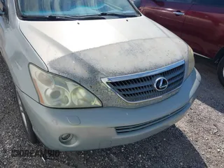 2007 Lexus RX 400h z VIN JTJGW31U272002926, wystawiony jako IAAI lot #41792083 z przebiegiem 227 063 mil mil oraz . Historia ofert i sprzedaży dostępna na DreamBid. Obrazek 6.