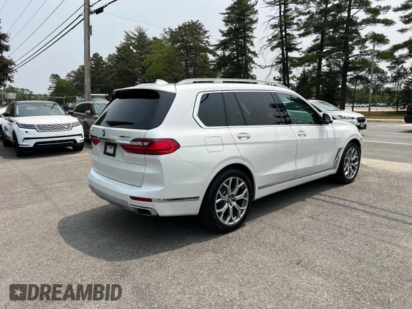 2019 BMW X7 xDrive50i z VIN 5UXCX4C55KLS38210, wystawiony jako Copart lot #59935315 z przebiegiem 126 853 mil mil oraz Czysty tytuł • Clean title. Historia ofert i sprzedaży dostępna na DreamBid. Obrazek 4.
