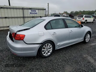 2011 Volkswagen Jetta SE with VIN 3VWDZ7AJ5BM319091, listed as a Copart auction lot 57991585 with 185,458 mi miles and Salvage title. Bid and sale history available at DreamBid. Image 3.