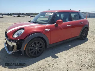2016 MINI Hardtop 4 Door z VIN WMWXU1C59G2D11957, wystawiony jako Copart lot #56366745 z przebiegiem 101 387 mil mil oraz Szkoda całkowita • Salvage title. Historia ofert i sprzedaży dostępna na DreamBid. Obrazek 1.