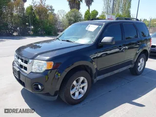 2012 Ford Escape XLT with VIN 1FMCU0D71CKC10734, listed as a IAAI auction lot 42065049 with 207,698 mi miles. Bid and sale history available at carsss.com. Image 2.