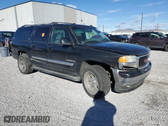 2005 GMC Yukon XL SLE with VIN 1GKEC16Z75J152954, listed as a Copart auction lot 86588284 with 164,185 mi miles and Salvage Title. Bid and sale history available at DreamBid. Image 4.