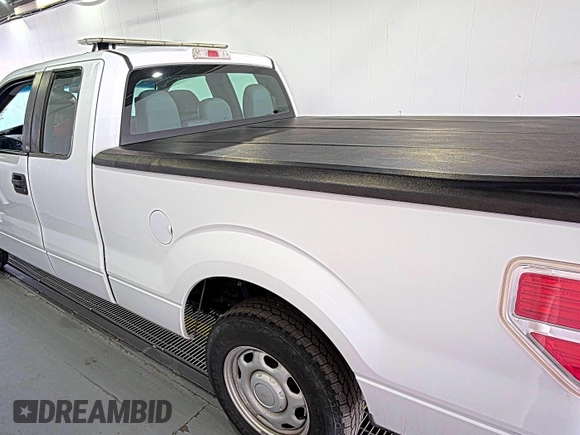2011 Ford F-150 XL with VIN 1FTEX1CM5BFC22989, listed as a IAAI auction lot 42780126 with 240,290 mi miles and . Bid and sale history available at DreamBid. Image 9.