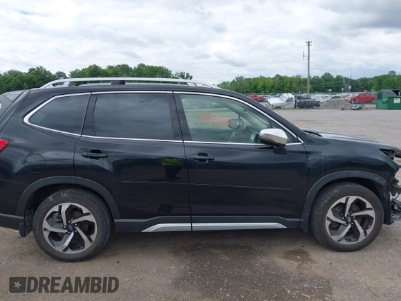 2023 Subaru Forester Touring with VIN JF2SKARC4PH485522, listed as a IAAI auction lot 42544425 with 38,872 mi miles and . Bid and sale history available at DreamBid. Image 14.