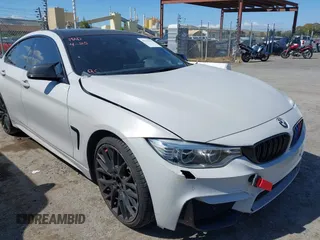 2015 BMW 4 Series 428i xDrive with VIN WBA4C9C54FD330582, listed as a IAAI auction lot 42135691 with 127,289 mi miles and . Bid and sale history available at DreamBid. Image 18.