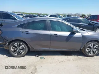2016 Honda Civic EX-L with VIN 2HGFC1F77GH640323, listed as a IAAI auction lot 41969858 with Not provided miles and . Bid and sale history available at DreamBid. Image 12.
